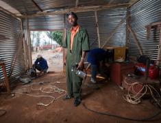 Man with electrical tools Rwanda